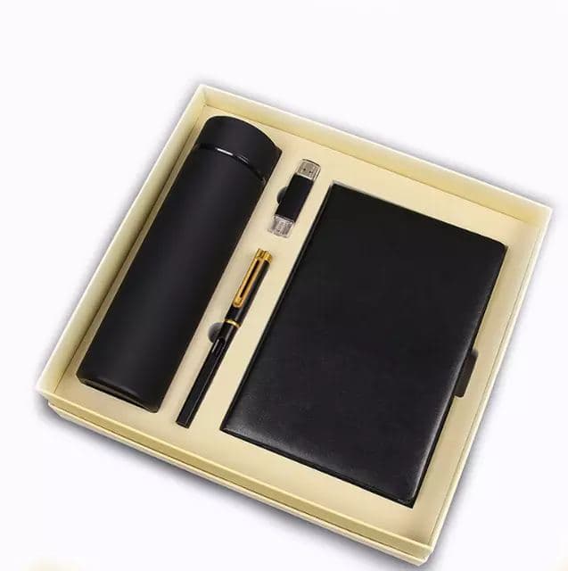 A notebook and flask gift set in a presentation box