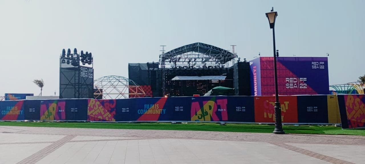 Branded fencing around an outdoor stage area