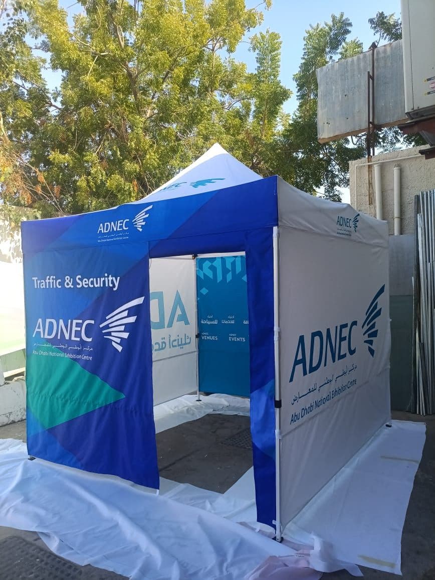 A pop-up gazebo printed with event branding